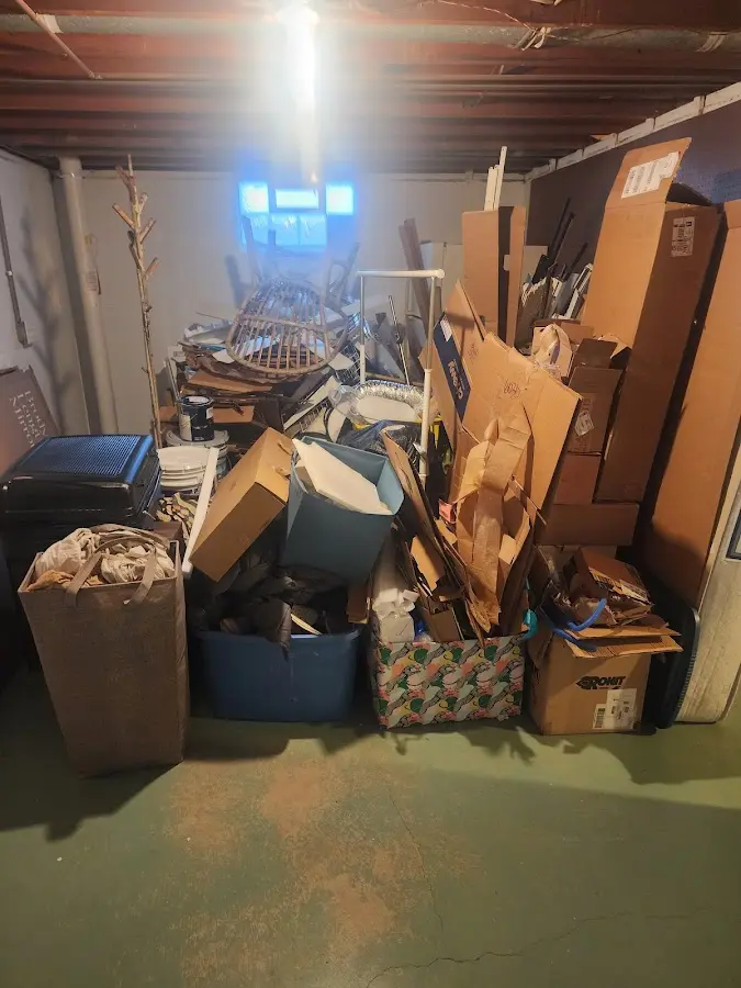 Roll-off dumpster container at job site for 2 Yard Dumpster Rental in Kissimmee